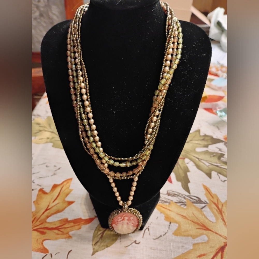 Elegant Multi-Strand Beaded Necklace with Pendant